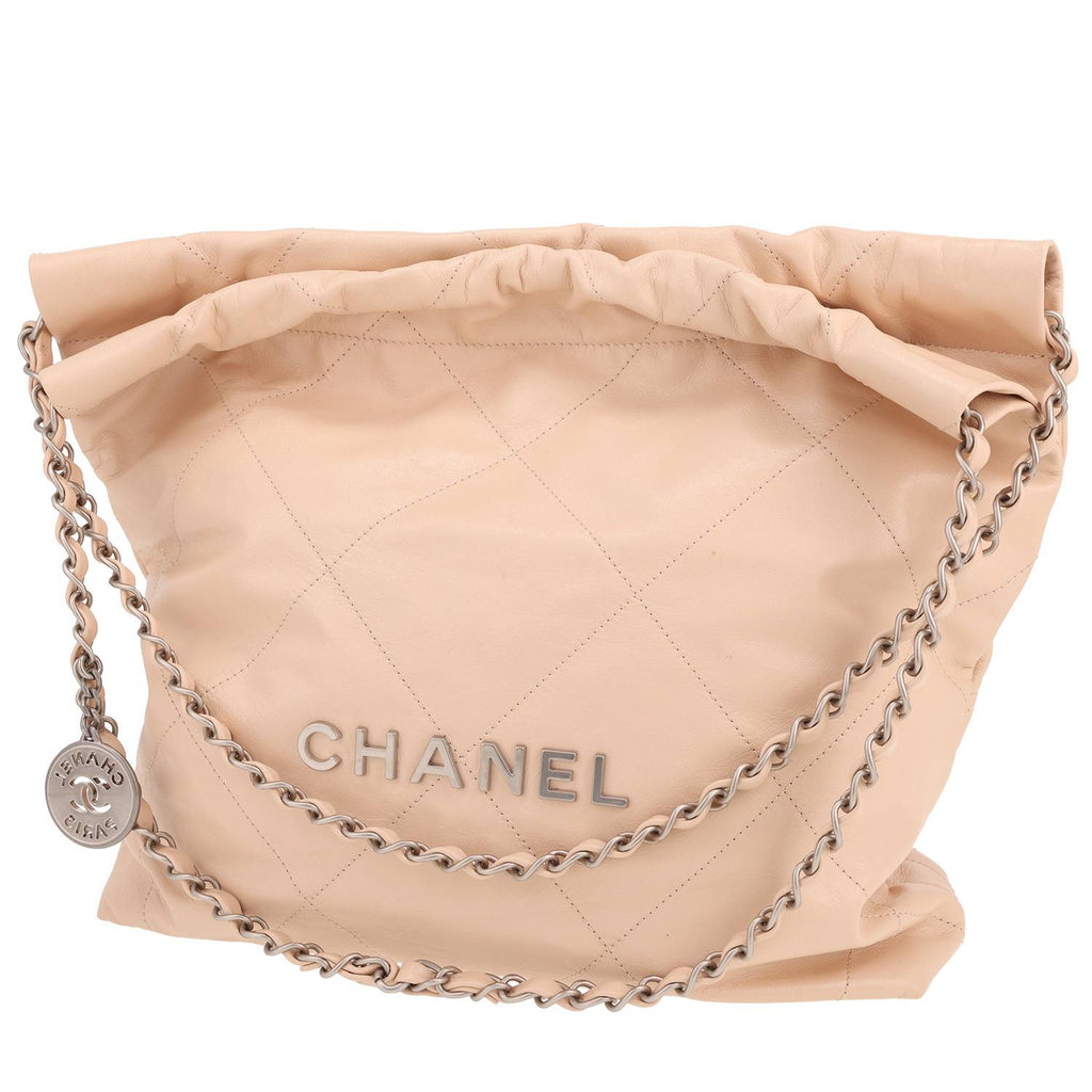 Chanel 22 shopping bag in beige leather