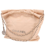 Chanel 22 shopping bag in beige leather