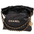 Chanel 22 small model handbag in black leather