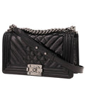 Chanel Boy shoulder bag in black patent leather