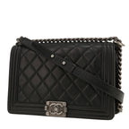 Chanel Boy shoulder bag in black quilted leather