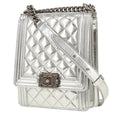 Chanel Boy shoulder bag in silver patent quilted leather
