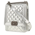Chanel Boy shoulder bag in silver patent quilted leather