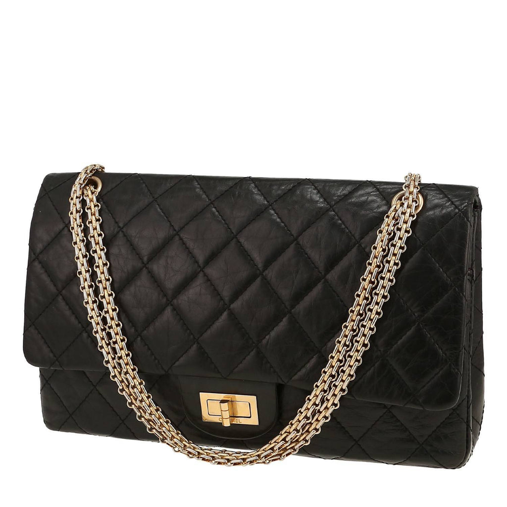 Chanel 2.55 handbag in black quilted leather
