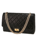 Chanel 2.55 handbag in black quilted leather