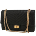 Chanel 2.55 shoulder bag in black chevron quilted leather