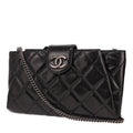 Chanel clutch bag in black distressed leather