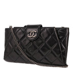 Chanel clutch bag in black distressed leather