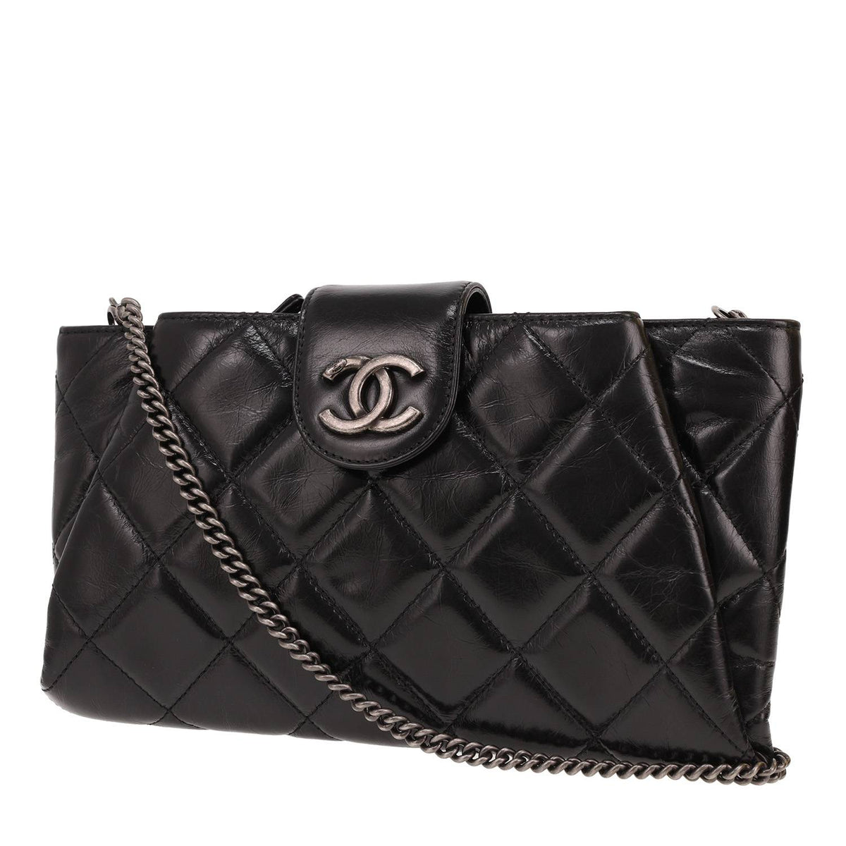Chanel clutch bag in black distressed leather