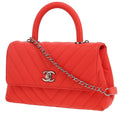 Chanel Coco Handle shoulder bag in red chevron quilted leather