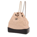 Chanel Gabrielle backpack in beige quilted leather and black leather