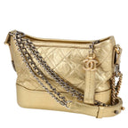 Chanel Gabrielle small model shoulder bag in gold quilted leather