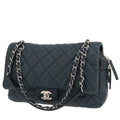 Chanel handbag Blue quilted grained leather flap bag