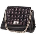 Chanel handbag in black patent leather