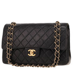 Chanel handbag in black quilted leather