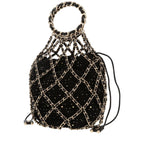 Chanel handbag in black tweed and black leather