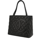 Chanel Medaillon handbag in black quilted grained leather