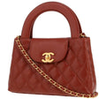 Chanel Mini Shopping handbag in cognac quilted leather
