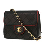 Chanel Mini Timeless handbag in black and burgundy quilted leather