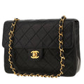 Chanel Mini Timeless shoulder bag in black quilted leather