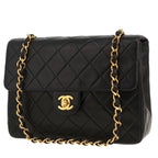 Chanel Mini Timeless shoulder bag in black quilted leather