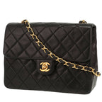 Chanel Mini Timeless shoulder bag in black quilted leather