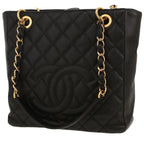 Chanel Shopping GST small model handbag in black quilted grained leather