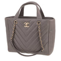 Chanel Statement Tote small model handbag in grey chevron quilted leather