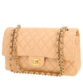 Chanel Timeless Classic handbag in beige quilted leather