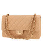 Chanel Timeless Classic handbag in beige quilted leather
