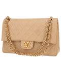 Chanel Timeless Classic handbag in beige quilted leather