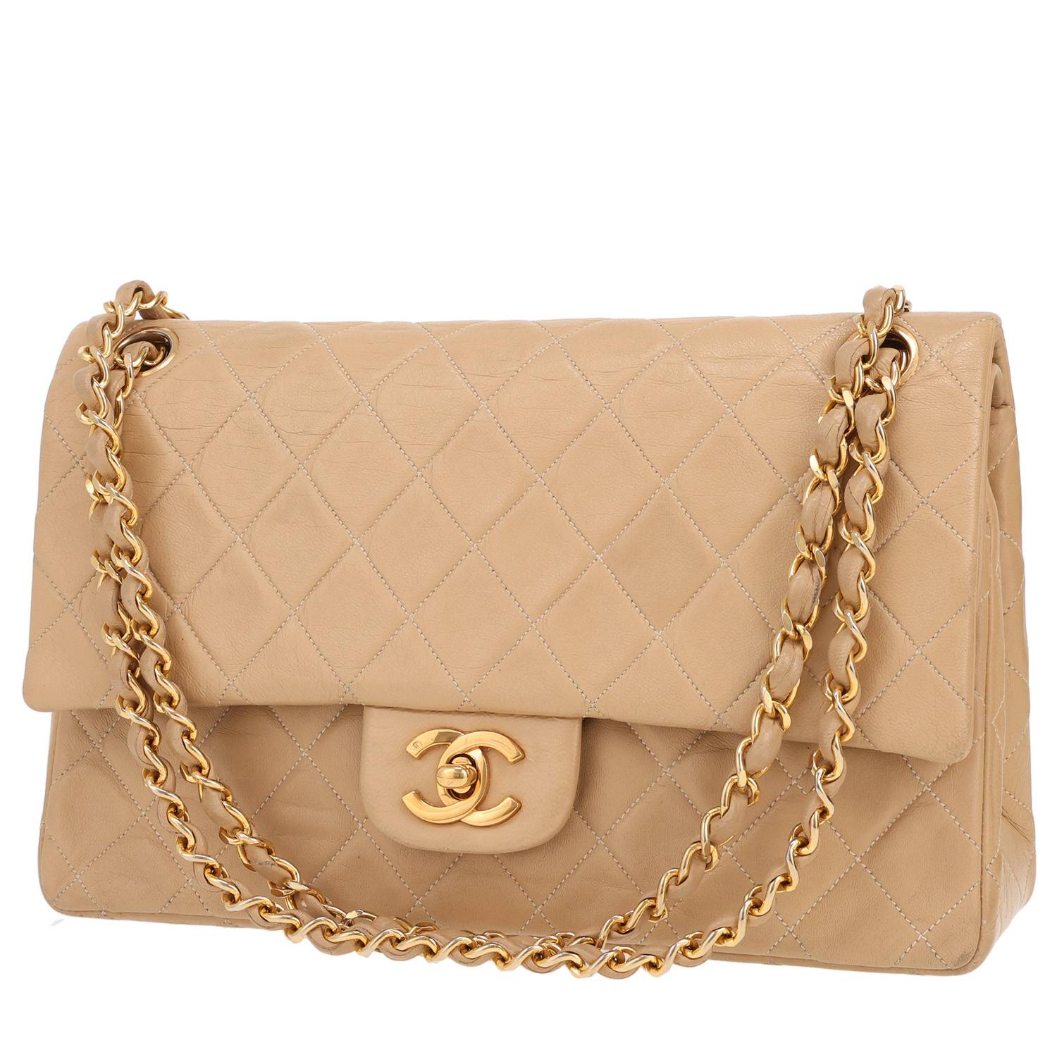 Chanel Timeless Classic handbag in beige quilted leather