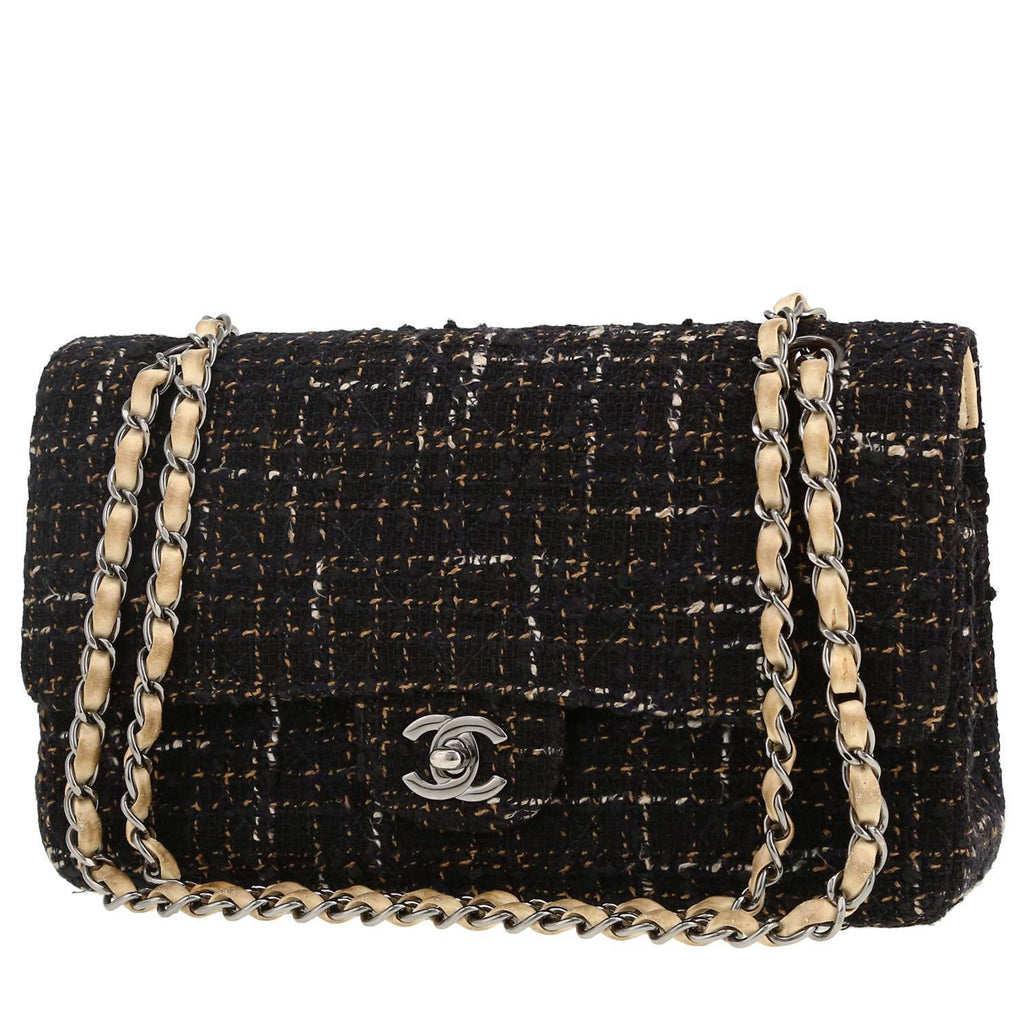 Chanel Timeless Classic handbag in black and cream color quilted tweed and cream color leather
