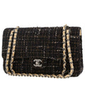 Chanel Timeless Classic handbag in black and cream color quilted tweed and cream color leather
