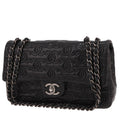 Chanel Timeless Classic handbag in black monogram leather