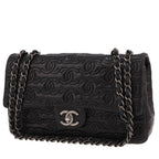 Chanel Timeless Classic handbag in black monogram leather