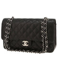 Chanel Timeless Classic handbag in black quilted grained leather