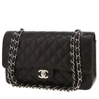 Chanel Timeless Classic handbag in black quilted grained leather