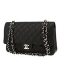 Chanel Timeless Classic handbag in black quilted grained leather