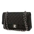 Chanel Timeless Classic handbag in black quilted grained leather
