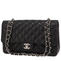 Chanel Timeless Classic handbag in black quilted grained leather