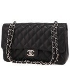 Chanel Timeless Classic handbag in black quilted grained leather