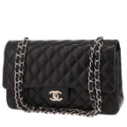 Chanel Timeless Classic handbag in black quilted leather