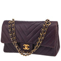 Chanel Timeless Classic handbag in purple chevron quilted leather