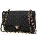 Chanel Timeless Jumbo handbag in black quilted grained leather