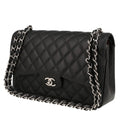 Chanel Timeless Jumbo handbag in black quilted grained leather