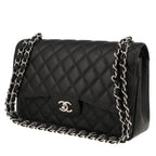 Chanel Timeless Jumbo handbag in black quilted grained leather