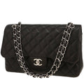 Chanel Timeless Jumbo handbag in black quilted grained leather