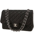 Chanel Timeless Jumbo handbag in black quilted grained leather