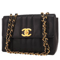 Chanel Timeless Jumbo shoulder bag in black quilted grained leather